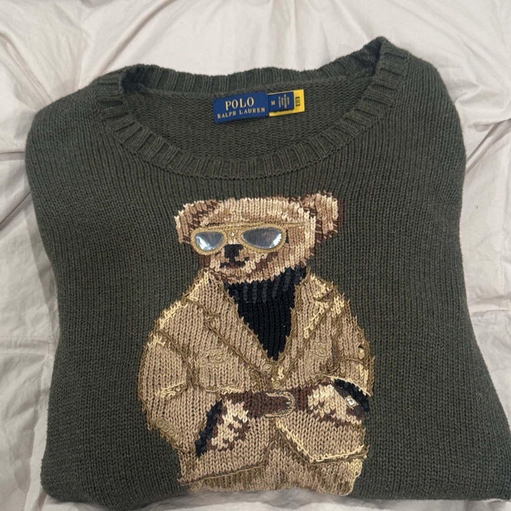 Polo by Ralph Lauren Men's Olive Sweater with Bear Motif with mirrored lenses.